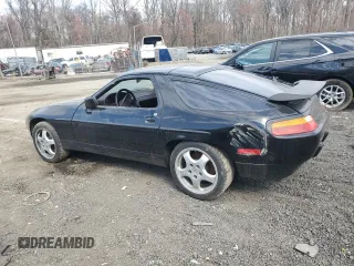 1988 Porsche 928 z VIN WP0JB0921JS860322, wystawiony jako Copart lot #48548495 z przebiegiem 136 427 mil mil oraz Szkody całkowita. Historia ofert i sprzedaży dostępna na DreamBid. Obrazek 2.