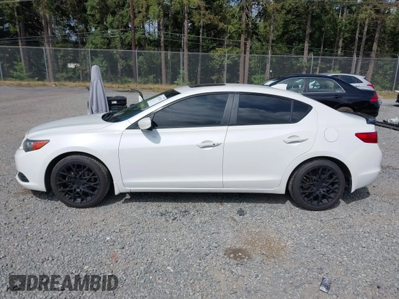 2014 Acura ILX Premium with VIN 19VDE1F54EE010386, listed as a IAAI auction lot 42587225 with 145,613 mi miles and . Bid and sale history available at DreamBid. Image 14.