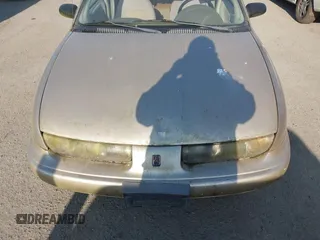 1996 Saturn SW z VIN 1G8ZK8270TZ292057, wystawiony jako IAAI lot #42100826 z przebiegiem 207 561 mil mil oraz . Historia ofert i sprzedaży dostępna na DreamBid. Obrazek 6.