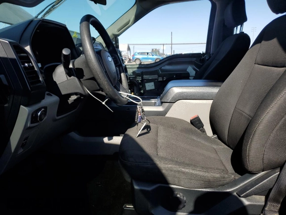 2020 Ford F-150 XL with VIN 1FTEW1CP0LFA72448, listed as a Copart auction lot 59237885 with 87,060 mi miles and Salvage title. Bid and sale history available at DreamBid. Image 7.