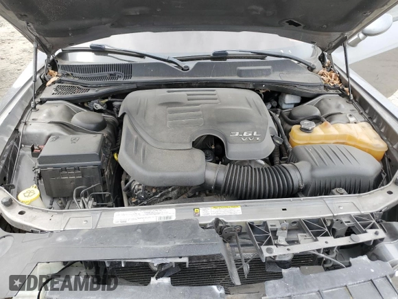 2011 Dodge Challenger z VIN 2B3CJ4DG5BH570472, wystawiony jako Copart lot #58479265 z przebiegiem Nie podano mil oraz Szkoda całkowita • Salvage title. Historia ofert i sprzedaży dostępna na DreamBid. Obrazek 11.