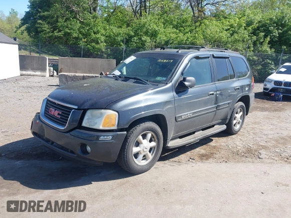 2005 GMC Envoy SLE with VIN 1GKDT13S552253519, listed as a IAAI auction lot 42113617 with 172,058 mi miles and . Bid and sale history available at DreamBid. Image 2.
