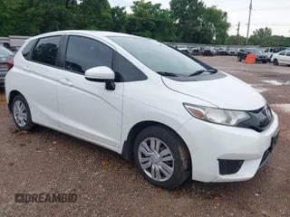 2017 Honda Fit LX z VIN JHMGK5H58HS014670, wystawiony jako IAAI lot #42348256 z przebiegiem 93 633 mil mil oraz . Historia ofert i sprzedaży dostępna na DreamBid. Obrazek 1.