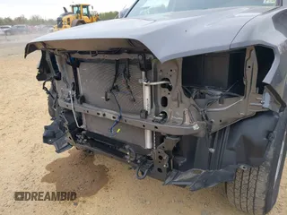 2022 Toyota Tacoma SR with VIN 3TYCZ5AN3NT078324, listed as a IAAI auction lot 42007132 with 35,802 mi miles and . Bid and sale history available at DreamBid. Image 6.