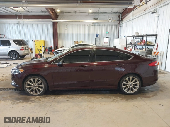 2017 Ford Fusion Titanium with VIN 3FA6P0K91HR171231, listed as a IAAI auction lot 41131312 with 115,265 mi miles. Bid and sale history available at carsss.com. Image 14.