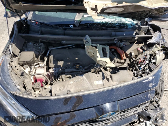2020 Toyota RAV4 Hybrid XLE with VIN 2T3RWRFV0LW091705, listed as a Copart auction lot 58636775 with 68,534 mi miles and Salvage title. Bid and sale history available at DreamBid. Image 12.