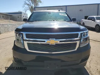2019 Chevrolet Suburban LS with VIN 1GNSCGKC6KR180042, listed as a Copart auction lot 76829394 with 75,574 mi miles and Salvage title. Bid and sale history available at DreamBid. Image 5.