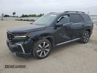 2023 Honda Pilot Elite z VIN 5FNYG1H80PB004477, wystawiony jako Copart lot #53323635 z przebiegiem 26 616 mil mil oraz Szkoda całkowita • Salvage title. Historia ofert i sprzedaży dostępna na DreamBid. Obrazek 1.