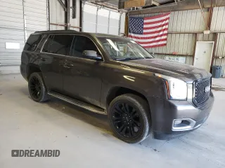 2019 GMC Yukon SLT with VIN 1GKS2BKC8KR163973, listed as a Copart auction lot 59042214 with 119,269 mi miles and Salvage Title. Bid and sale history available at carsss.com. Image 4.