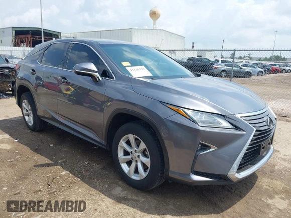 2016 Lexus RX 350 z VIN 2T2ZZMCAXGC031079, wystawiony jako IAAI lot #42120190 z przebiegiem 142 407 mil mil oraz . Historia ofert i sprzedaży dostępna na DreamBid. Obrazek 1.