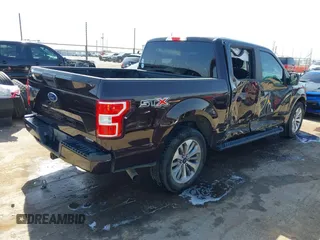 2018 Ford F-150 XL with VIN 1FTEW1CP5JKC93838, listed as a IAAI auction lot 42007069 with 92,117 mi miles and . Bid and sale history available at DreamBid. Image 4.