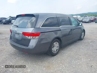 2014 Honda Odyssey LX z VIN 5FNRL5H27EB007683, wystawiony jako IAAI lot #42427304 z przebiegiem 325 359 mil mil oraz . Historia ofert i sprzedaży dostępna na DreamBid. Obrazek 4.