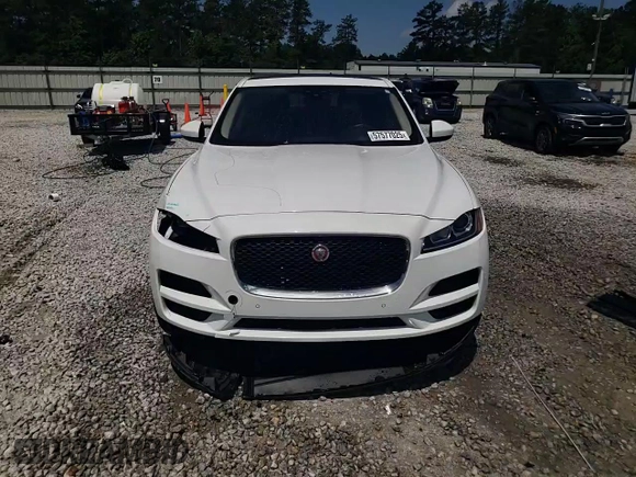 2020 Jaguar F-Pace 25t z VIN SADCS2FX2LA638535, wystawiony jako Copart lot #57577025 z przebiegiem 70 037 mil mil oraz Szkoda całkowita • Salvage title. Historia ofert i sprzedaży dostępna na DreamBid. Obrazek 14.