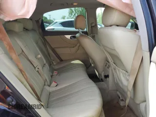2016 Infiniti QX70 z VIN JN8CS1MW0GM750145, wystawiony jako Copart lot #56013635 z przebiegiem 142 476 mil mil oraz Szkody całkowita. Historia ofert i sprzedaży dostępna na DreamBid. Obrazek 11.