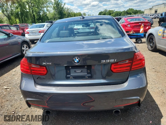 2014 BMW 3 Series 335i xDrive with VIN WBA3B9C58EJ466051, listed as a Copart auction lot 65060915 with Not provided miles and Salvage title. Bid and sale history available at DreamBid. Image 6.