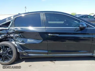 2019 Hyundai Sonata Sport with VIN 5NPE34AF2KH792374, listed as a IAAI auction lot 41987740 with 77,209 mi miles. Bid and sale history available at carsss.com. Image 13.