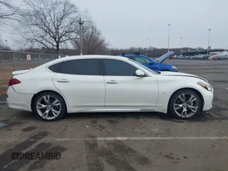 2019 Infiniti Q70 Luxe with VIN JN1BY1PP2KM685045, listed as a IAAI auction lot 41477367 with 54,094 mi miles and . Bid and sale history available at DreamBid. Image 13.