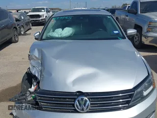 2016 Volkswagen Jetta Sedan 1.8T SEL with VIN 3VWL07AJ0GM330058, listed as a IAAI auction lot 41832211 with 1 mi miles. Bid and sale history available at carsss.com. Image 10.