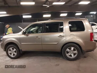 2009 Honda Pilot EX-L with VIN 5FNYF48639B011686, listed as a IAAI auction lot 41958353 with 155,382 mi miles and . Bid and sale history available at carsss.com. Image 14.