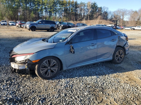 2019 Honda Civic Hatchback EX with VIN SHHFK7H62KU412137, listed as a Copart auction lot 50773365 with 90,811 mi miles and Clean Title. Bid and sale history available at carsss.com. Image 1.