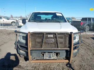 2015 Ford F-150 XLT w/HD Payload Pkg with VIN 1FTFW1EF8FFC07270, listed as a IAAI auction lot 41425948 with 194,107 mi miles. Bid and sale history available at carsss.com. Image 6.