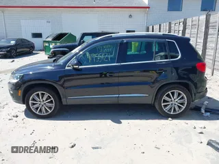 2012 Volkswagen Tiguan SEL with VIN WVGAV7AX2CW529232, listed as a IAAI auction lot 41955121 with 164,885 mi miles and . Bid and sale history available at DreamBid. Image 14.