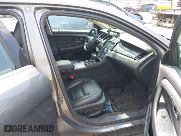 2012 Ford Taurus SEL z VIN 1FAHP2EWXCG138038, wystawiony jako IAAI lot #42007614 z przebiegiem 155 045 mil mil oraz . Historia ofert i sprzedaży dostępna na DreamBid. Obrazek 5.