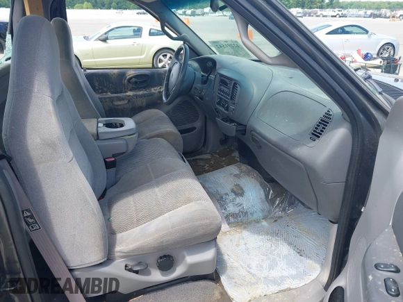 2002 Ford F-150 XL with VIN 1FTRF17W22NA77707, listed as a IAAI auction lot 42291542 with Not provided miles and . Bid and sale history available at DreamBid. Image 5.
