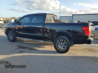 2016 Nissan Titan XD Platinum Reserve with VIN 1N6BA1F26GN500372, listed as a Copart auction lot 80907454 with 67,126 mi miles and Clean Title. Bid and sale history available at carsss.com. Image 2.