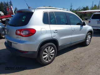 2011 Volkswagen Tiguan SE with VIN WVGBV7AX7BW529097, listed as a IAAI auction lot 42182690 with 139,878 mi miles and . Bid and sale history available at DreamBid. Image 4.