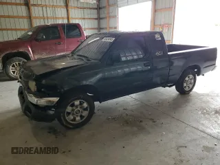 1999 Nissan Frontier XE with VIN 1N6DD26S1XC334585, listed as a Copart auction lot 60434845 with 255,220 mi miles and Salvage title. Bid and sale history available at DreamBid. Image 1.