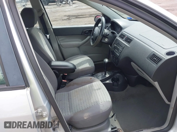 2007 Ford Focus S with VIN 1FAFP34N07W141693, listed as a IAAI auction lot 42310938 with 150,489 mi miles and . Bid and sale history available at DreamBid. Image 5.