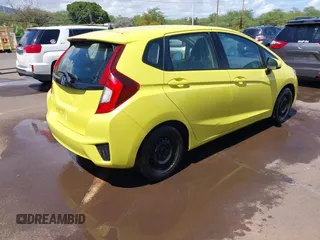 2016 Honda Fit LX with VIN JHMGK5H56GX011347, listed as a IAAI auction lot 42067854 with 106,969 mi miles and . Bid and sale history available at DreamBid. Image 4.