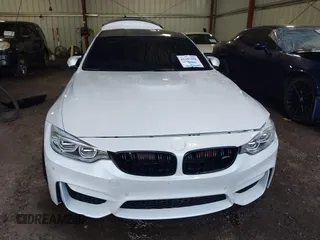 2015 BMW M4 z VIN WBS3R9C59FK331843, wystawiony jako IAAI lot #42105398 z przebiegiem 105 348 mil mil oraz . Historia ofert i sprzedaży dostępna na DreamBid. Obrazek 12.