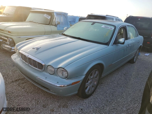 2005 Jaguar XJ with VIN SAJWA79C05SG37189, listed as a Copart auction lot 76804104 with 0 mi miles and Salvage Title. Bid and sale history available at carsss.com. Image 1.