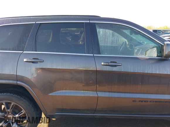2015 Jeep Grand Cherokee Laredo with VIN 1C4RJFAGXFC631123, listed as a IAAI auction lot 41859251 with 201,558 mi miles. Bid and sale history available at carsss.com. Image 13.