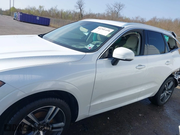 2019 Volvo XC60 Momentum with VIN LYV102DK0KB219297, listed as a IAAI auction lot 41781458 with 80,524 mi miles and . Bid and sale history available at DreamBid. Image 14.