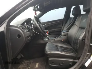 2012 Chrysler 300 S z VIN 2C3CCABG0CH306995, wystawiony jako Copart lot #58811675 z przebiegiem 127 498 mil mil oraz Szkoda całkowita • Salvage title. Historia ofert i sprzedaży dostępna na DreamBid. Obrazek 7.