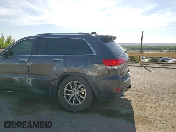 2014 Jeep Grand Cherokee Limited with VIN 1C4RJFBT6EC410774, listed as a Copart auction lot 58011005 with 166,506 mi miles and Salvage title. Bid and sale history available at DreamBid. Image 15.