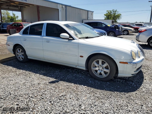 2003 Jaguar S-Type with VIN SAJEA01T93FM54729, listed as a Copart auction lot 49589035 with 162,737 mi miles and Salvage Title. Bid and sale history available at carsss.com. Image 4.