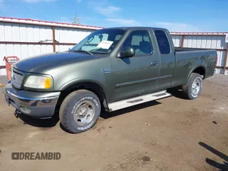 2002 Ford F-150 XL with VIN 2FTRX18W42CA61719, listed as a IAAI auction lot 42146516 with 99,774 mi miles and . Bid and sale history available at DreamBid. Image 2.