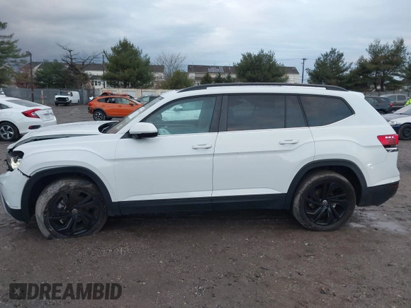 2022 Volkswagen Atlas SE z VIN 1V2KR2CA1NC555087, wystawiony jako IAAI lot #40921013 z przebiegiem 62 834 mil mil oraz . Historia ofert i sprzedaży dostępna na DreamBid. Obrazek 14.