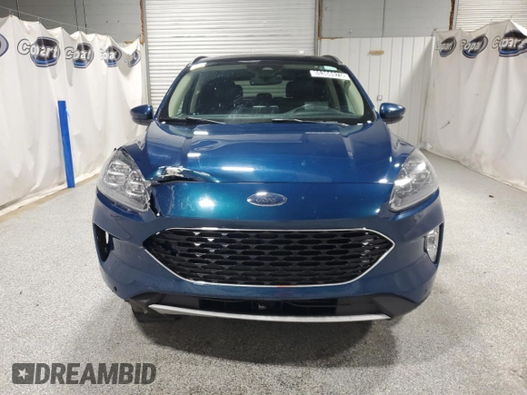 2020 Ford Escape Titanium z VIN 1FMCU9J98LUA93393, wystawiony jako Copart lot #65366925 z przebiegiem 74 750 mil mil oraz Czysty tytuł • Clean title. Historia ofert i sprzedaży dostępna na DreamBid. Obrazek 5.