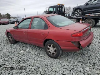 2000 Ford Contour z VIN 3FAFP6635YM116450, wystawiony jako Copart lot #44007405 z przebiegiem 361 094 mil mil oraz Szkoda całkowita • Salvage title. Historia ofert i sprzedaży dostępna na DreamBid. Obrazek 2.