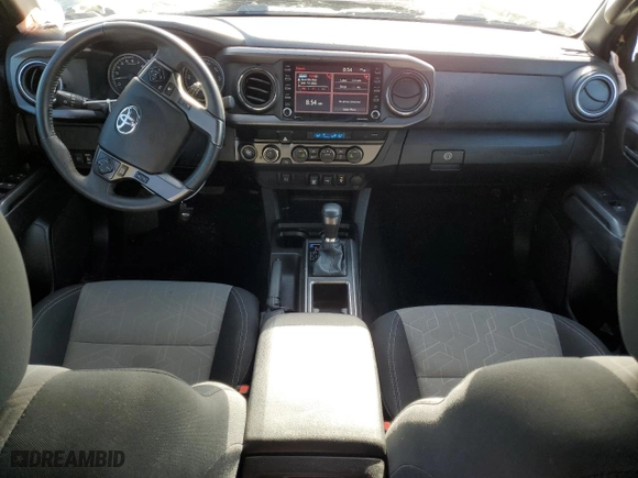 2023 Toyota Tacoma 4WD SR with VIN 3TMCZ5AN5PM538629, listed as a Copart auction lot 51848135 with 30,672 mi miles and Salvage Title. Bid and sale history available at carsss.com. Image 8.
