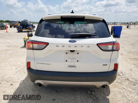 2021 Ford Escape Titanium Hybrid z VIN 1FMCU0DZ6MUA03327, wystawiony jako Copart lot #59558845 z przebiegiem 67 569 mil mil oraz Czysty tytuł • Clean title. Historia ofert i sprzedaży dostępna na DreamBid. Obrazek 6.
