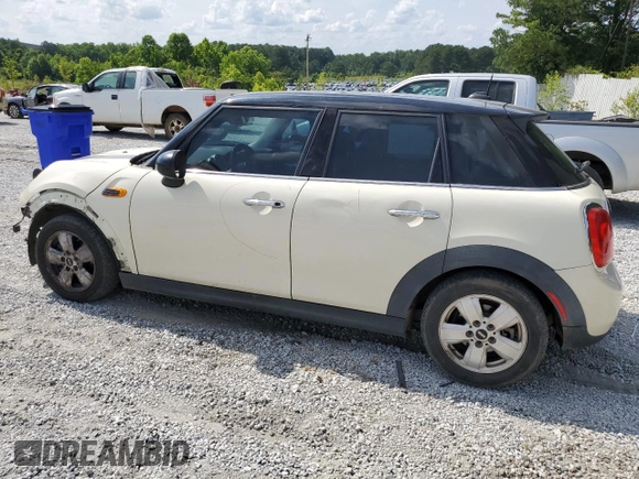 2016 MINI Hardtop 4 Door with VIN WMWXU1C59G2D08847, listed as a Copart auction lot 59763805 with 114,105 mi miles and Salvage title. Bid and sale history available at DreamBid. Image 2.