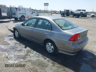 2004 Honda Civic with VIN JHMES96674S020013, listed as a IAAI auction lot 41827411 with 118,601 mi miles. Bid and sale history available at carsss.com. Image 3.