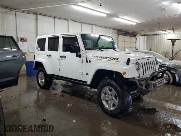 2017 Jeep Wrangler Unlimited Rubicon Recon with VIN 1C4HJWFG9HL543266, listed as a Copart auction lot 87771705 with 50,223 mi miles and Salvage title. Bid and sale history available at DreamBid. Image 4.