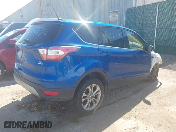 2017 Ford Escape SE with VIN 1FMCU9GD2HUA10771, listed as a IAAI auction lot 39225590 with 56,324 mi miles and . Bid and sale history available at DreamBid. Image 4.